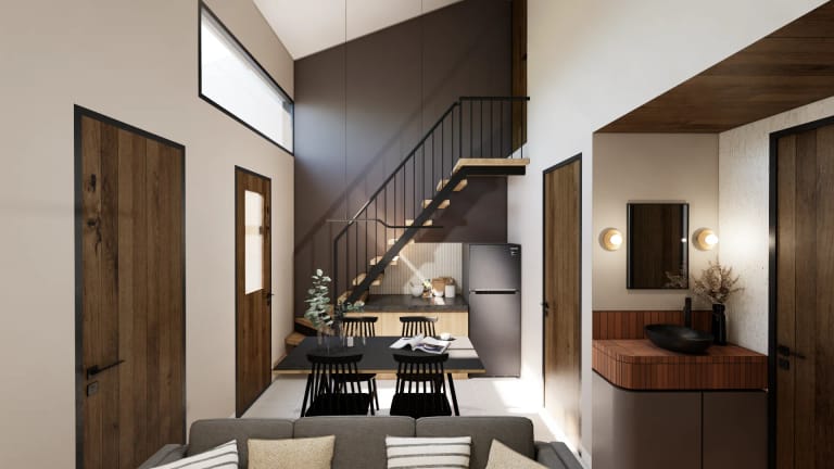 Ruang keluarga lantai bawah Mula Sudimara — living room dengan tangga kayu TV dan sofa modern